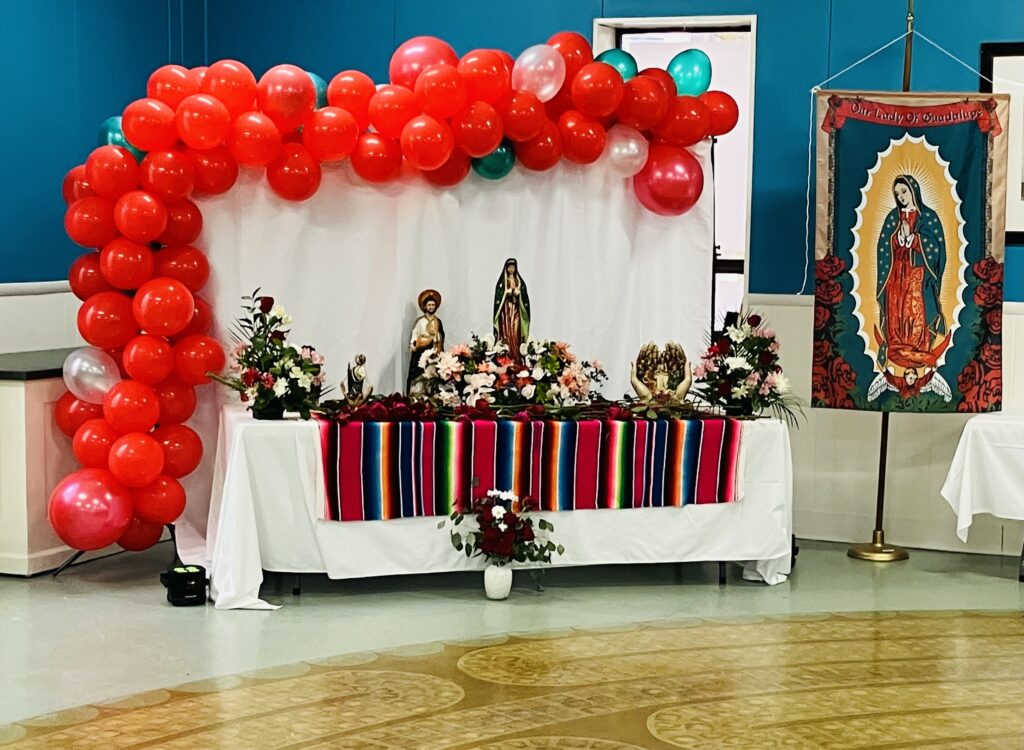 a table with balloons and decorations on it